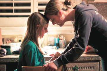 mom and daughter in kitchen